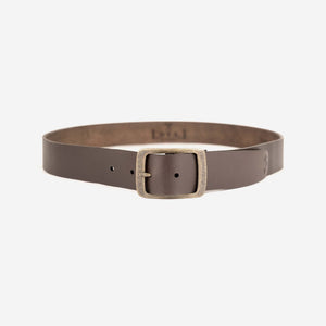 a rich brown leather belt with an aged brass buckle and etched logo detailing.